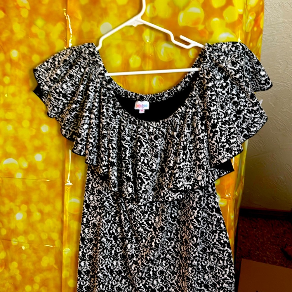 Lula Roe dress extra large New with tags. Off the shoulder dress.